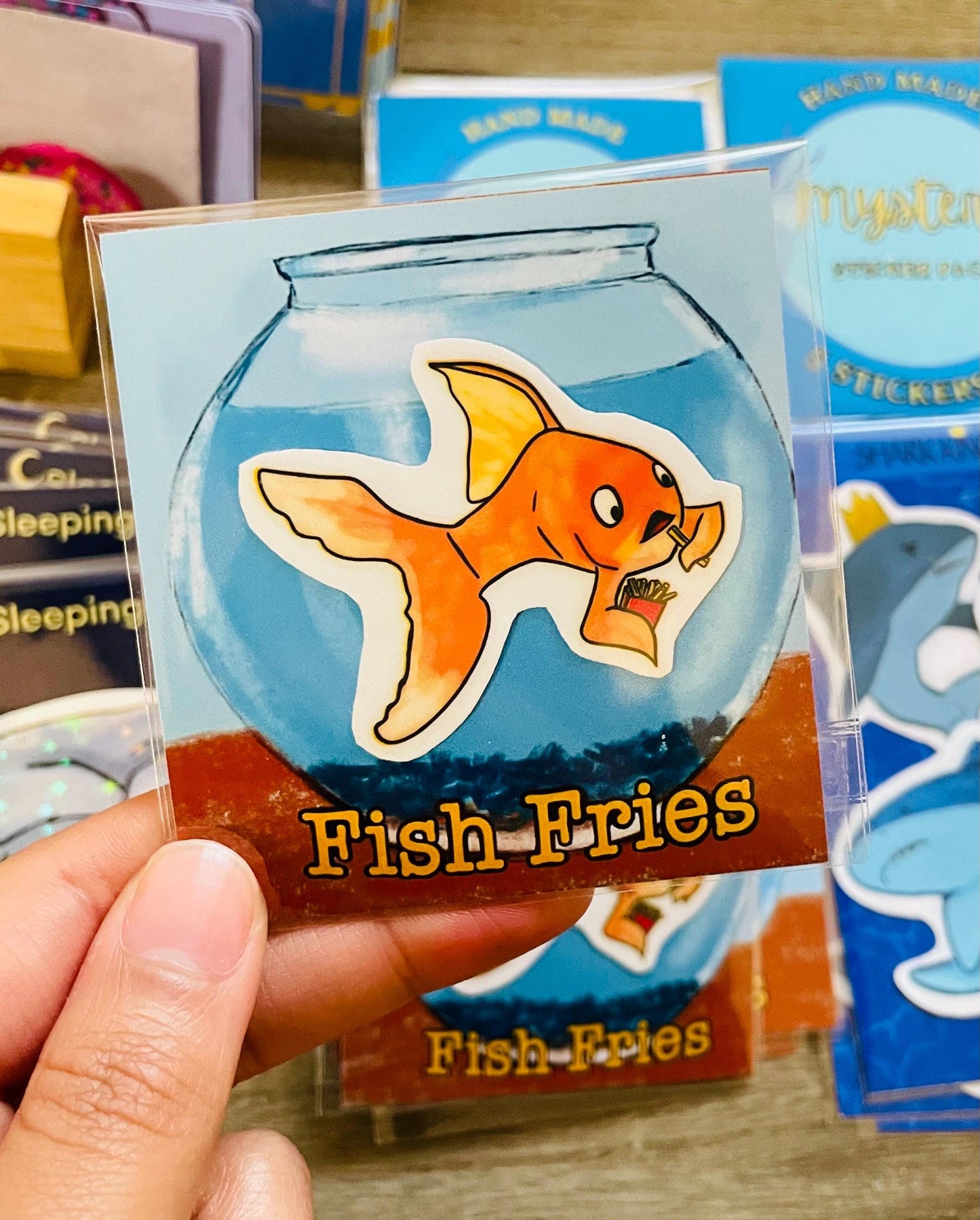 Adorable Gold Fish Snacking on French Fries Sticker
